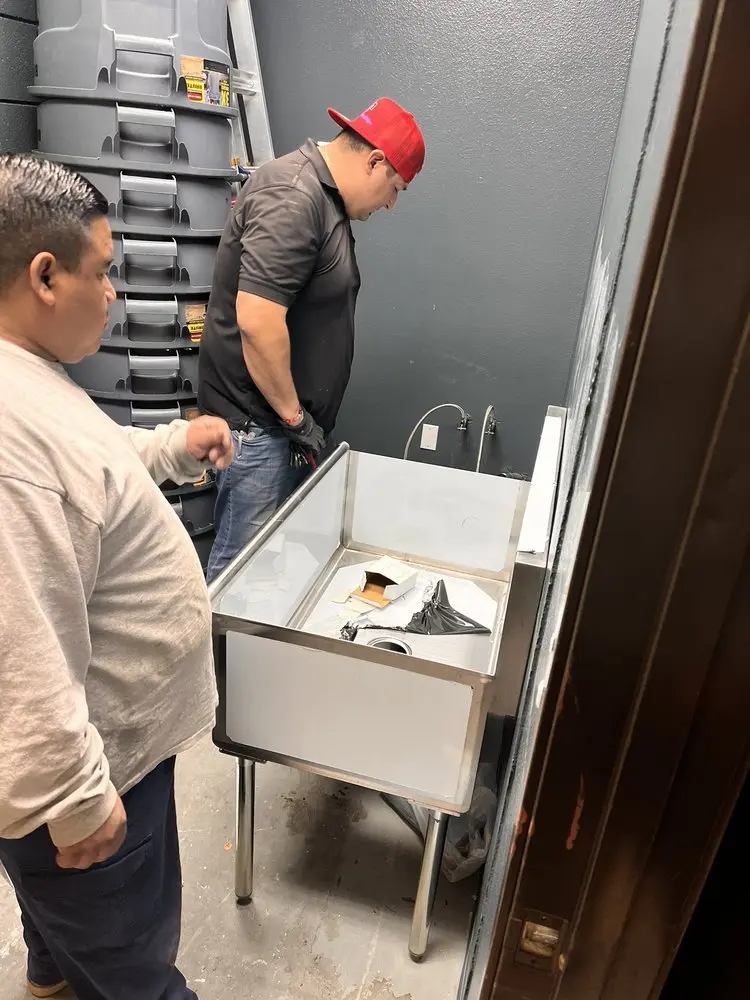 Commercial plumbing and sink installation in Quissett
